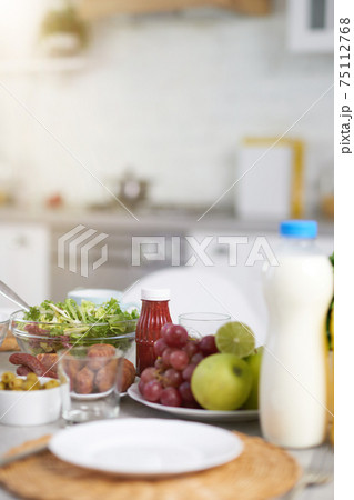 Start your morning. Close up of Latin American ingredients for breakfast on the table in modern kitchen interior Start your morning. Close up of Latin American ingredients for breakfast on the table in modern kitchen interior 75112768