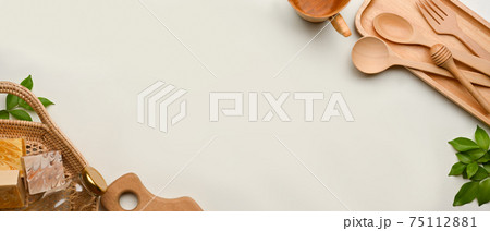 Zero waste concept, mock up scene with wooden kitchenware and copy space on background Zero waste concept, mock up scene with wooden kitchenware and copy space on background 75112881