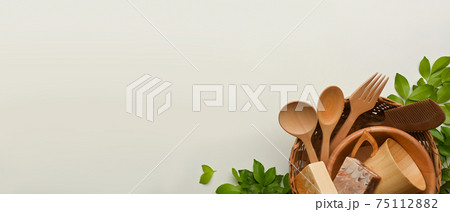 Zero waste concept, mock up scene with wooden kitchenware and copy space on white background Zero waste concept, mock up scene with wooden kitchenware and copy space on white background 75112882