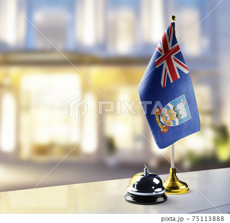 Falkland Islands flag on the reception desk in the lobby of the hotel Falkland Islands flag on the reception desk in the lobby of the hotel 75113888