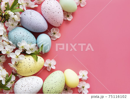 Colorful Easter eggs with spring blossom flowers 75116102
