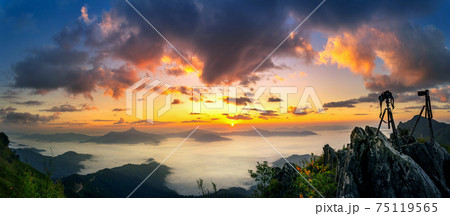 Panorama of Doi pha tang and sunrise in morning, Chiang rai, Thailand. Panorama of Doi pha tang and sunrise in morning, Chiang rai, Thailand. 75119565