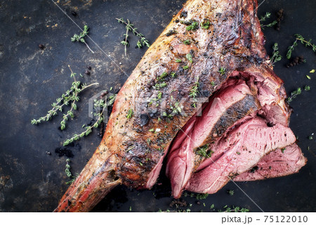 Traditional barbecue aged leg of venison sliced with herbs  75122010