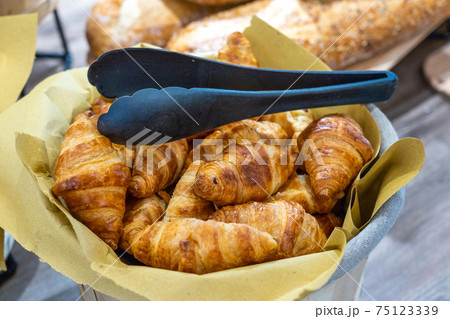 Delicious and fresh croissant pastry in luxury French restaurant Delicious and fresh croissant pastry in luxury French restaurant 75123339