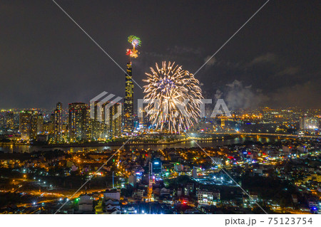 Beautiful fireworks celebrating on Ho Chi Minh city skyline 75123754