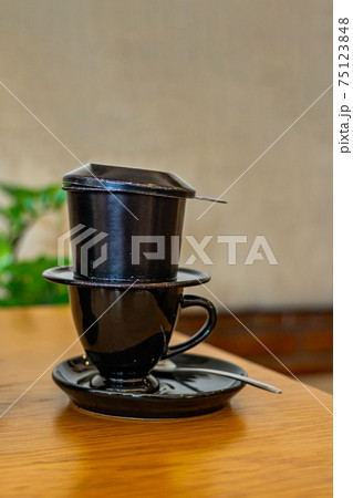 Vietnam traditional styled coffee dripping filter in black color Vietnam traditional styled coffee dripping filter in black color 75123848