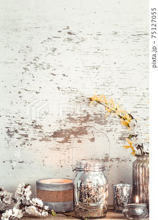 Home decor on wooden background with spring flowers Home decor on wooden background with spring flowers 75127055