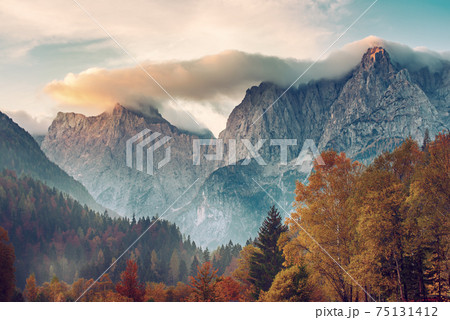 Triglav mountain peak at sunrise 75131412