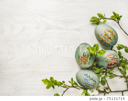 Easter eggs painted with colorful paints. View from above Easter eggs painted with colorful paints. View from above 75131714