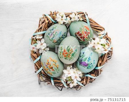 Easter eggs painted with colorful paints. View from above 75131715