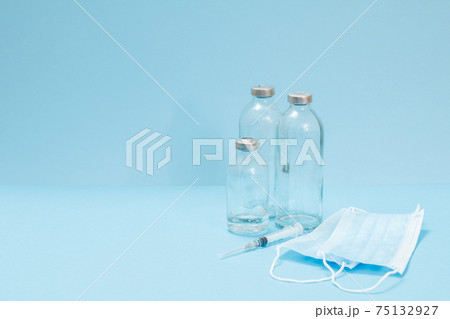 Medical masks, syringe and bottles for liquid medicine. 75132927