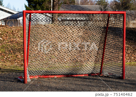Red road hockey net on children playground in Finland 75140462