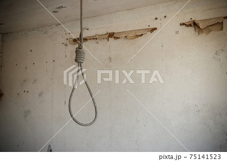 Deadly loop hanging from the ceiling in - Stock Photo [75141523