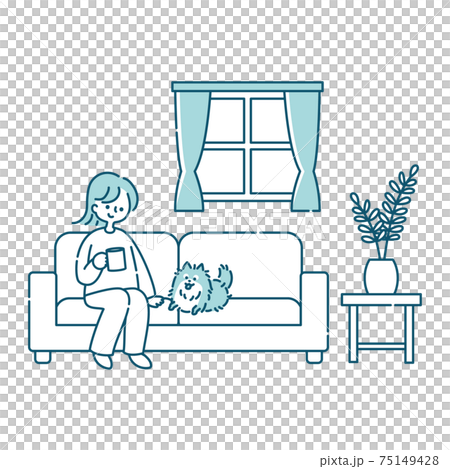 A woman sitting on the sofa in the living room and relaxing with her dog A woman sitting on the sofa in the living room and relaxing with her dog 75149428