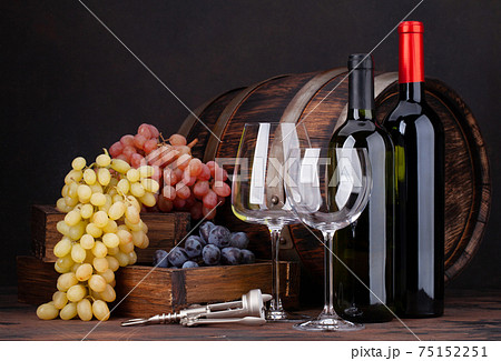 Wine bottles, grapes, cheese, glasses 75152251