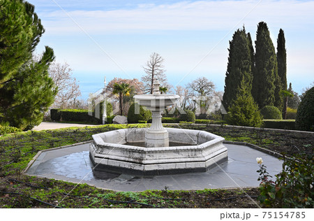Old fountain in beautiful garden of Livadia Palace in Crimea Old fountain in beautiful garden of Livadia Palace in Crimea 75154785