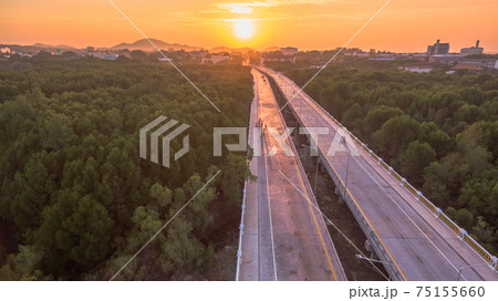 The sun rises over Thepsrisin Bridge. Thepsrisin Bridge is a shortcut to connect the city from Saphan Hin intersection with Sakdidet intersection in order to reduce the bad traffic congestion. The sun rises over Thepsrisin Bridge. Thepsrisin Bridge is a shortcut to connect the city from Saphan Hin intersection with Sakdidet intersection in order to reduce the bad traffic congestion. 75155660