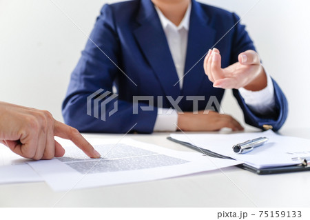 Sales manager giving advice application form document, considering mortgage loan offer for car and house insurance. 75159133