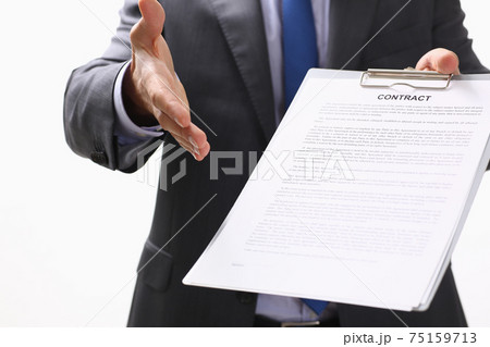Man in suit and tie give hand as hello in office 75159713