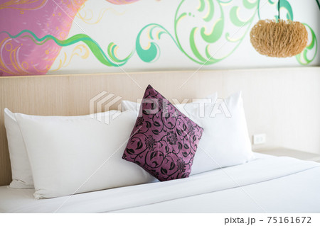 white bed in a bedroom at a hotel 75161672