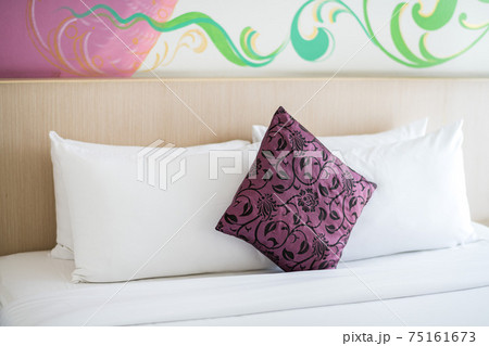 white bed in a bedroom at a hotel white bed in a bedroom at a hotel 75161673