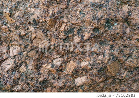 Close up on a stone wall. Background, texture. Close up on a stone wall. Background, texture. 75162883