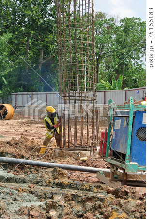 SELANGOR, MALAYSIA -MAY 16, 2017: Welder wearing protective mask during welding metal at the construction site. SELANGOR, MALAYSIA -MAY 16, 2017: Welder wearing protective mask during welding metal at the construction site. 75166183
