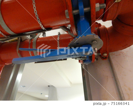 KAJANG, MALAYSIA -JUNE 16, 2017: Sprinkler system pipe in hang at the slab soffit. Sprinkler is an active fire fighting system in the building.  75166341