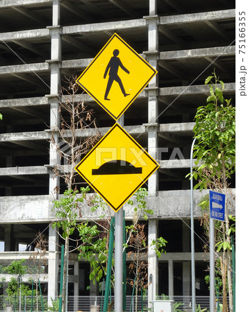 PEDESTRIAN CROSSING sign to alert motorist.  75166355