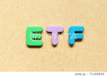 Foam alphabet letter in word ETF (abbreviation of Exchange Traded Fund) on wood background 75166609
