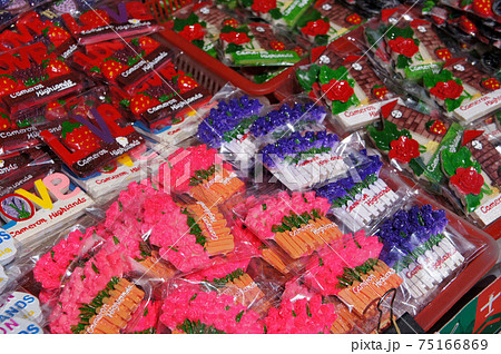 CAMERON HIGHLAND, MALAYSIA -MARCH 2, 2020: Magnetic refrigerators are sold wholesale in baskets. Sold in Malaysian ringgit. Tourists love to buy it as a souvenir. CAMERON HIGHLAND, MALAYSIA -MARCH 2, 2020: Magnetic refrigerators are sold wholesale in baskets. Sold in Malaysian ringgit. Tourists love to buy it as a souvenir. 75166869