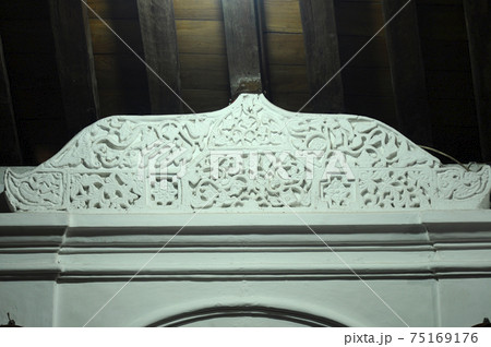 JOGJAKARTA, INDONESIA -JUNE 12, 2014: Stone work design and detail at Old Masjid Besar Mataram Kotagede, Jogjakarta Indonesia. According to history, the mosque was build on 1575. JOGJAKARTA, INDONESIA -JUNE 12, 2014: Stone work design and detail at Old Masjid Besar Mataram Kotagede, Jogjakarta Indonesia. According to history, the mosque was build on 1575. 75169176