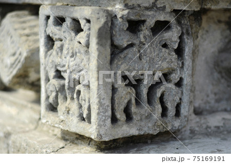 JOGJAKARTA, INDONESIA -JUNE 12, 2014: Stone work design and detail at Old Masjid Besar Mataram Kotagede, Jogjakarta Indonesia. According to history, the mosque was build on 1575. JOGJAKARTA, INDONESIA -JUNE 12, 2014: Stone work design and detail at Old Masjid Besar Mataram Kotagede, Jogjakarta Indonesia. According to history, the mosque was build on 1575. 75169191