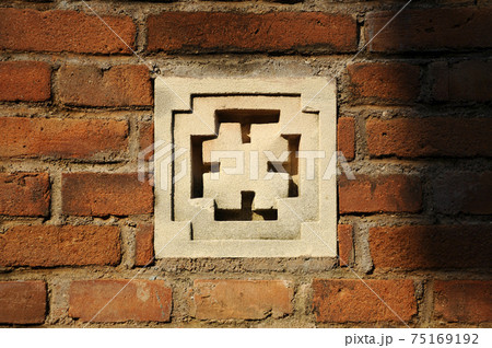 JOGJAKARTA, INDONESIA -JUNE 12, 2014: Stone work design and detail at Old Masjid Besar Mataram Kotagede, Jogjakarta Indonesia. According to history, the mosque was build on 1575. JOGJAKARTA, INDONESIA -JUNE 12, 2014: Stone work design and detail at Old Masjid Besar Mataram Kotagede, Jogjakarta Indonesia. According to history, the mosque was build on 1575. 75169192
