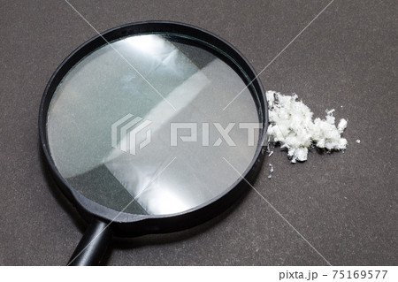 Hazardous mineral asbestos close up on black background 75169577