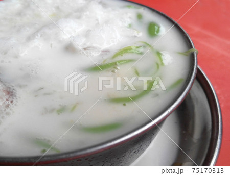 Malaysian desserts called Cendol .Cendol is made from crushed ice cubes and flour, and a variety of sweets and fruits. 75170313