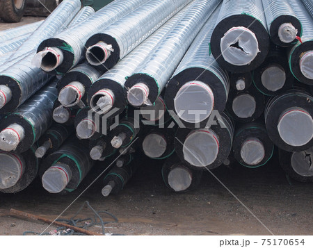 SEREMBAN, MALAYSIA - JULY 21, 2016: Air condition condensation pipe at the construction site. SEREMBAN, MALAYSIA - JULY 21, 2016: Air condition condensation pipe at the construction site. 75170654