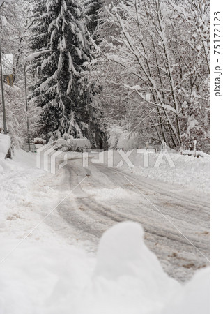 Snowy, slippery roads after heavy snowfall 75172123