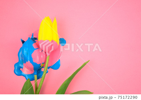 Colorful acrylic and yellow flower, tulip flat lay on clear pink background. Dripping vivid candy ink medium colors, blue, pink on floral. For your any ideas of important days, flat lay, artwork Colorful acrylic and yellow flower, tulip flat lay on clear pink background. Dripping vivid candy ink medium colors, blue, pink on floral. For your any ideas of important days, flat lay, artwork 75172290