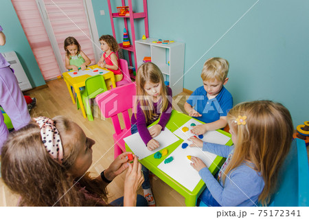 the happy children with tutors sculpt from plasticine 75172341