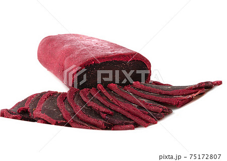 Jerky on a white background. Close-up of basturma sliced into pieces. 75172807
