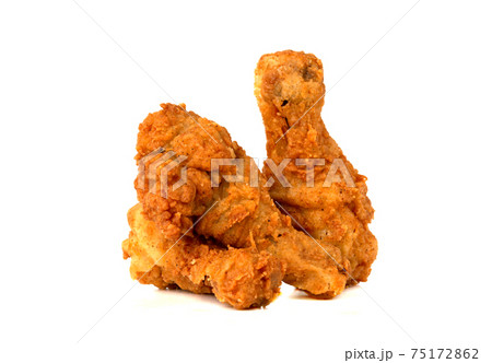 Fried legs on a white background. Chicken legs deep fried close-up. Fried legs on a white background. Chicken legs deep fried close-up. 75172862