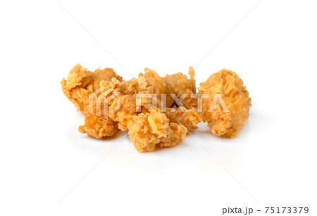 Slices of roasted meat on a white background. Fried chicken fillet close-up. 75173379