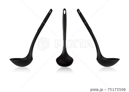 Ladle on a white background. Black soup ladle isolated on a white background. 75173506