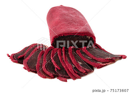 Jerky on a white background. Close-up of basturma sliced into pieces. 75173607
