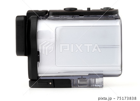 Portable video camera on a white background. An action camera in a protective case close-up. Portable video camera on a white background. An action camera in a protective case close-up. 75173838