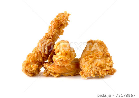 Fried chicken fillets on a white background. Fried chicken nuggets close-up. 75173967