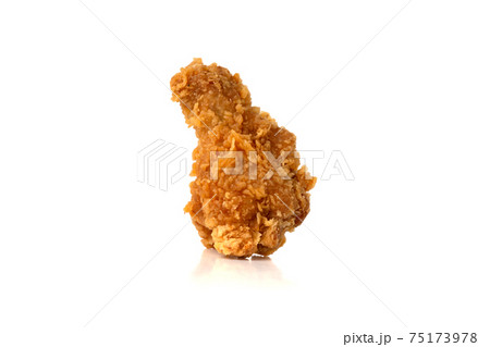 Wing fried on a white background. Fried chicken wing close-up. Wing fried on a white background. Fried chicken wing close-up. 75173978