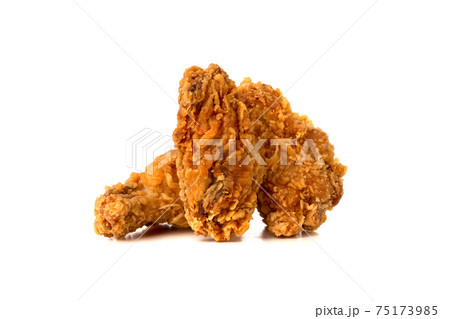 Fried wings on a white background. Deep-fried chicken wings close-up. Fried wings on a white background. Deep-fried chicken wings close-up. 75173985