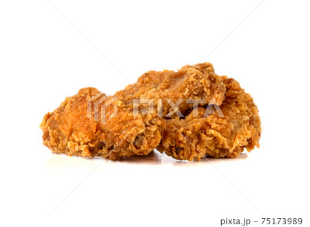 Fried wings on a white background. Deep-fried chicken wings close-up. Fried wings on a white background. Deep-fried chicken wings close-up. 75173989